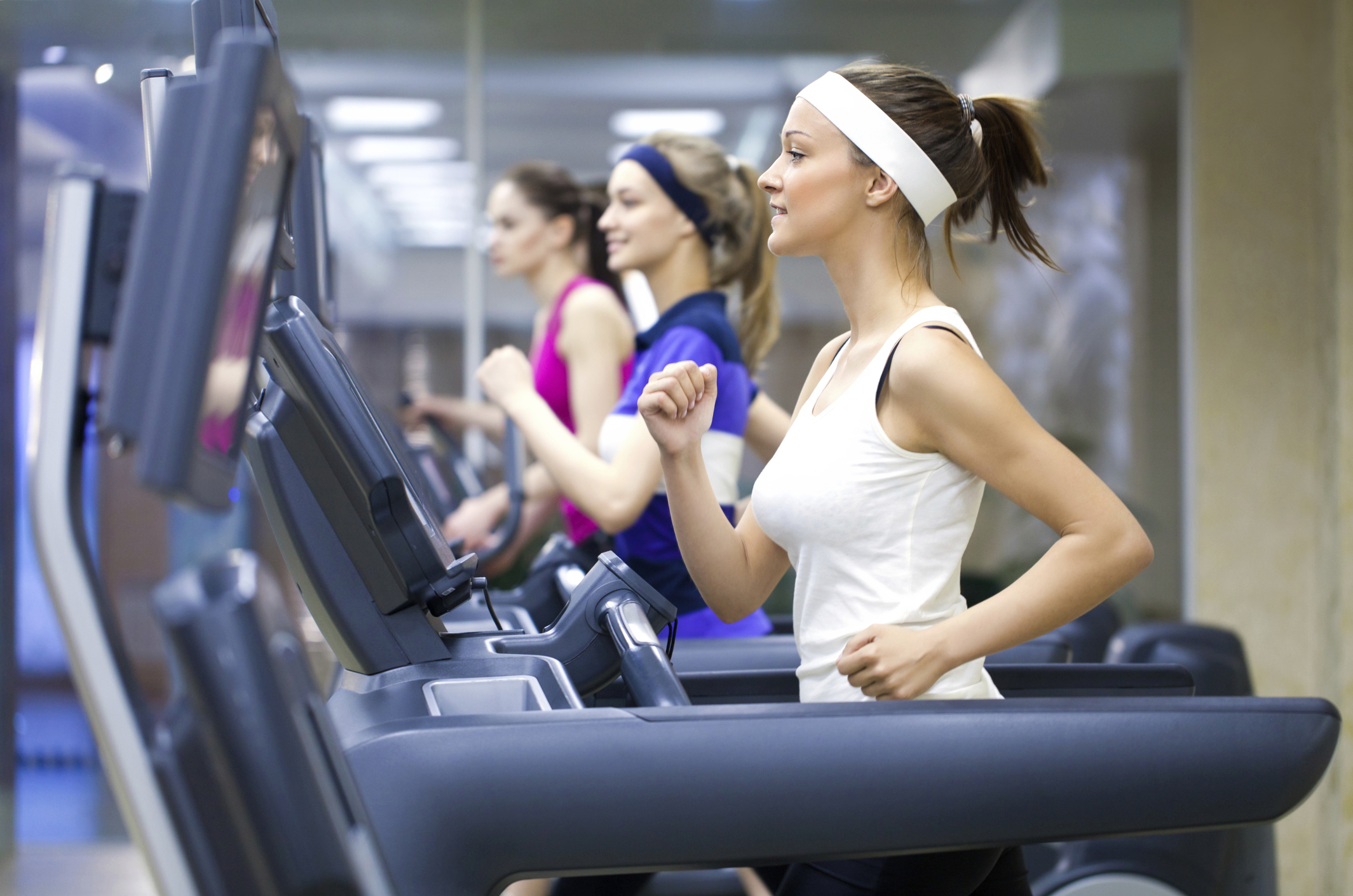 Three women on treadmills